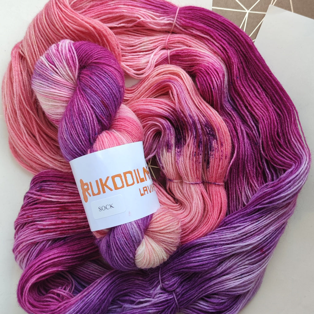 Hand dyed sock yarn in pink and purple tones, variegated fingering weight wool nylon yarn for knitting socks
