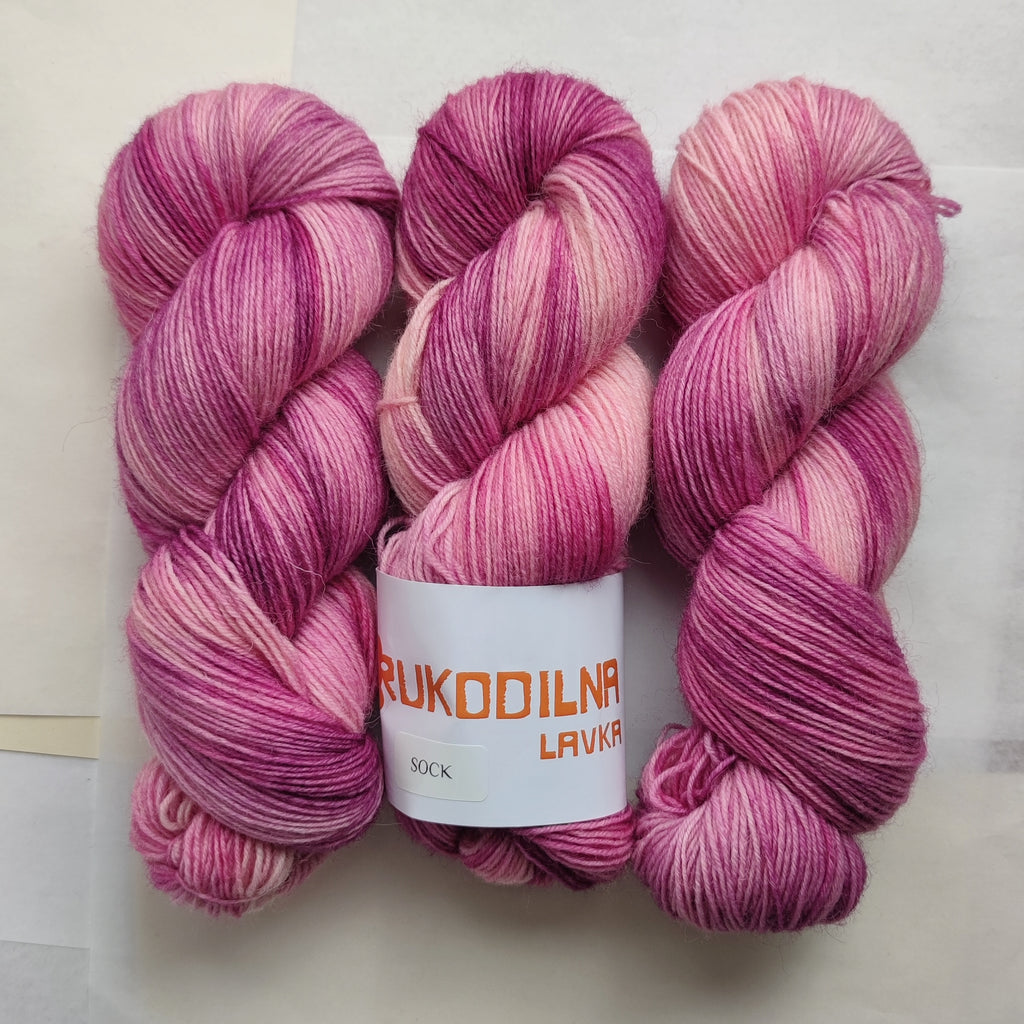 Hand dyed pink variegated sock yarn, merino nylon skein for knitting socks