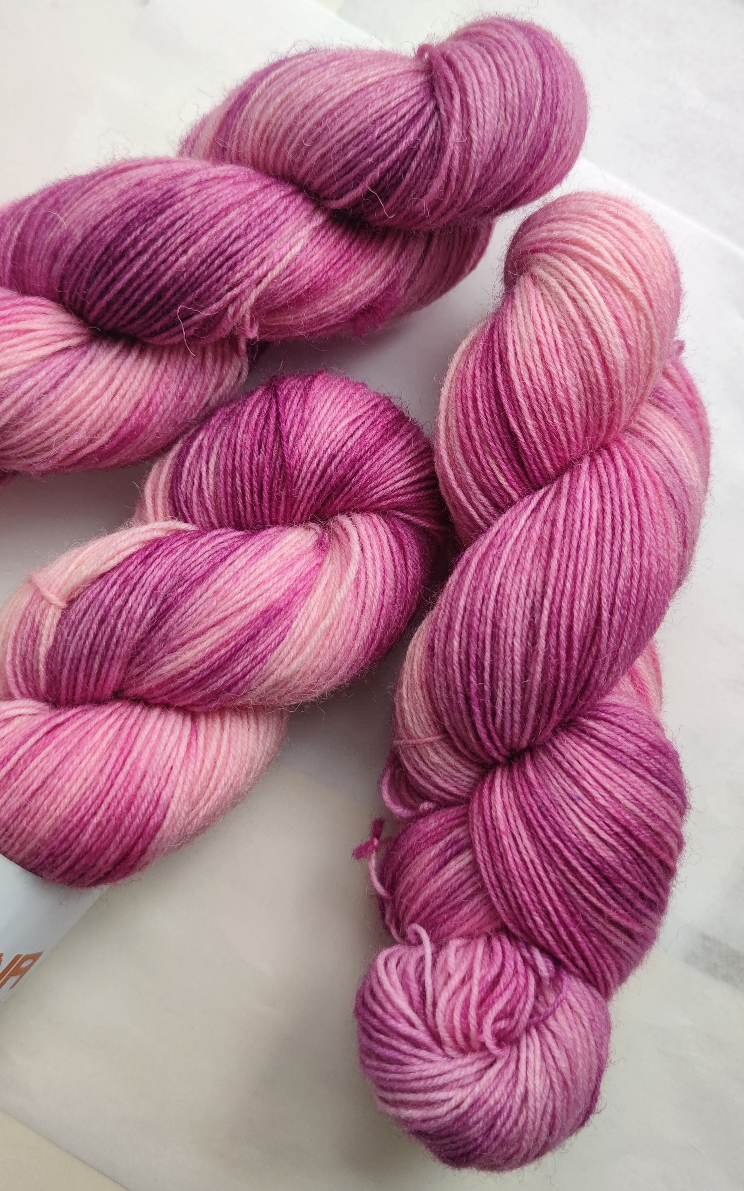 Hand dyed pink variegated sock yarn, merino nylon skein for knitting socks