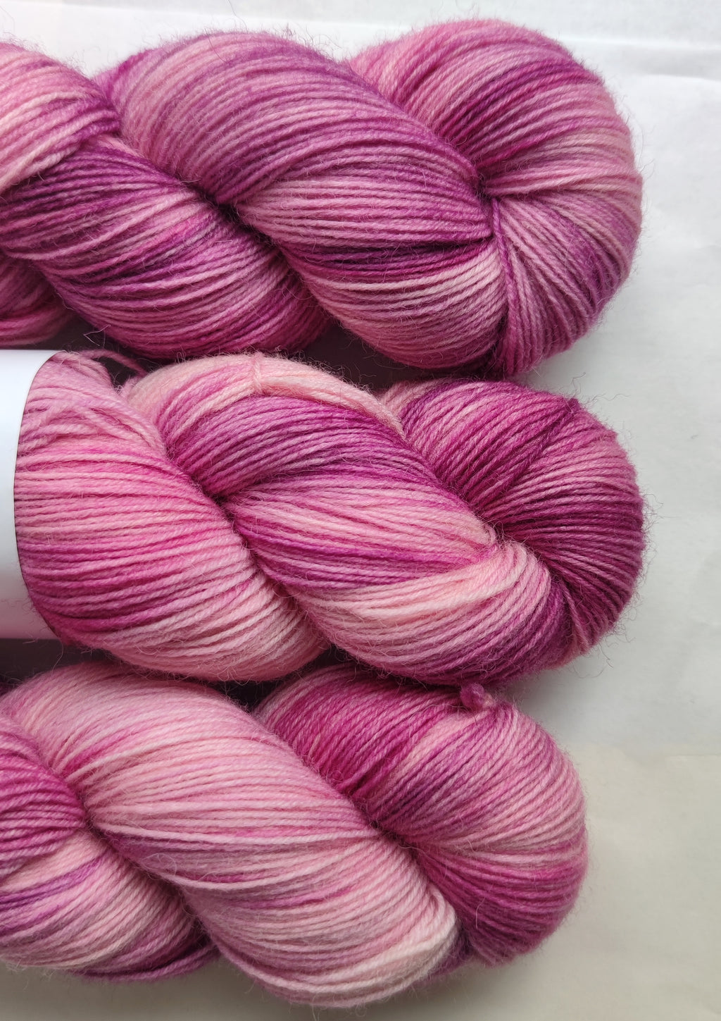 Hand dyed pink variegated sock yarn, merino nylon skein for knitting socks