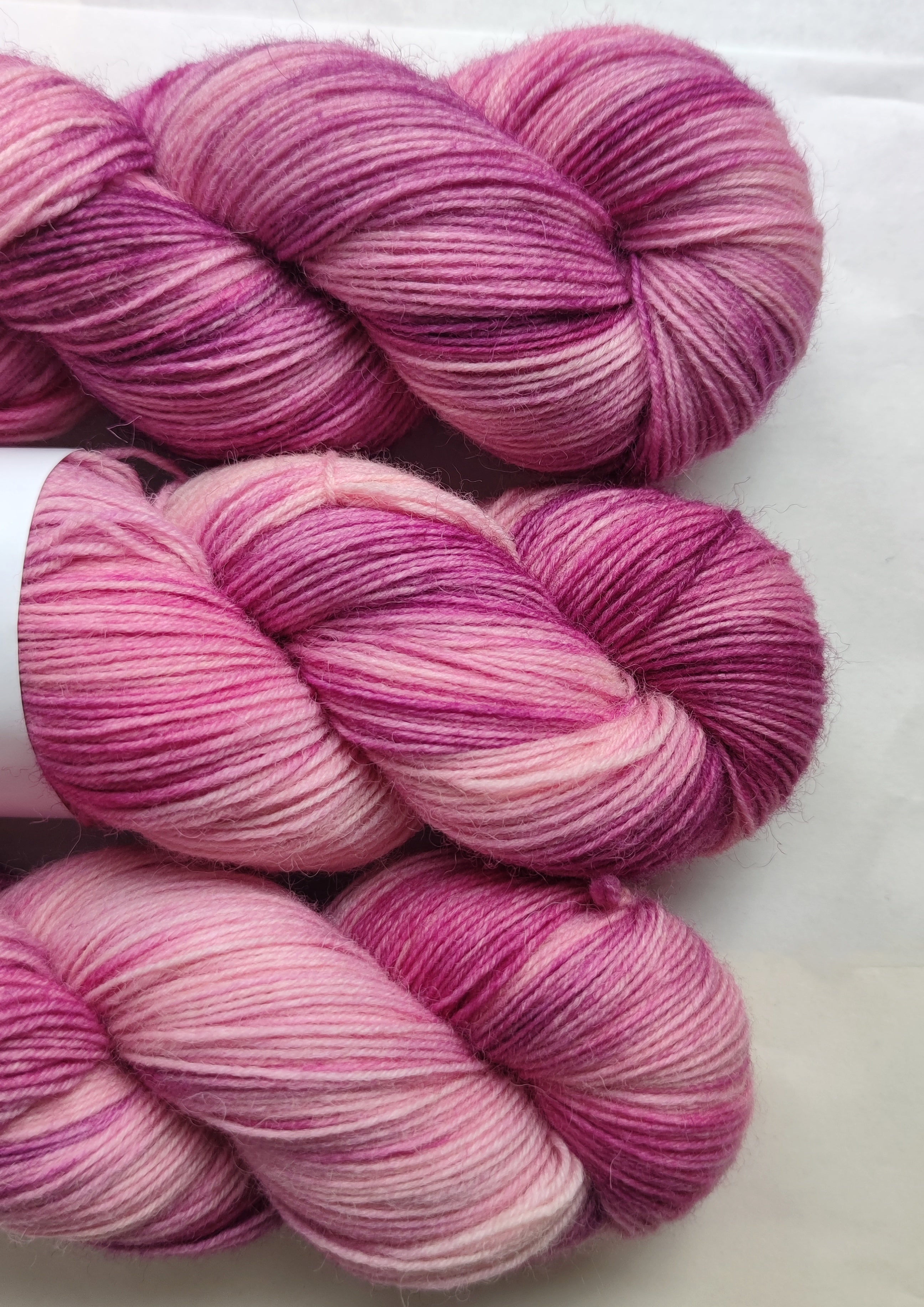Hand dyed pink variegated sock yarn, merino nylon skein for knitting socks