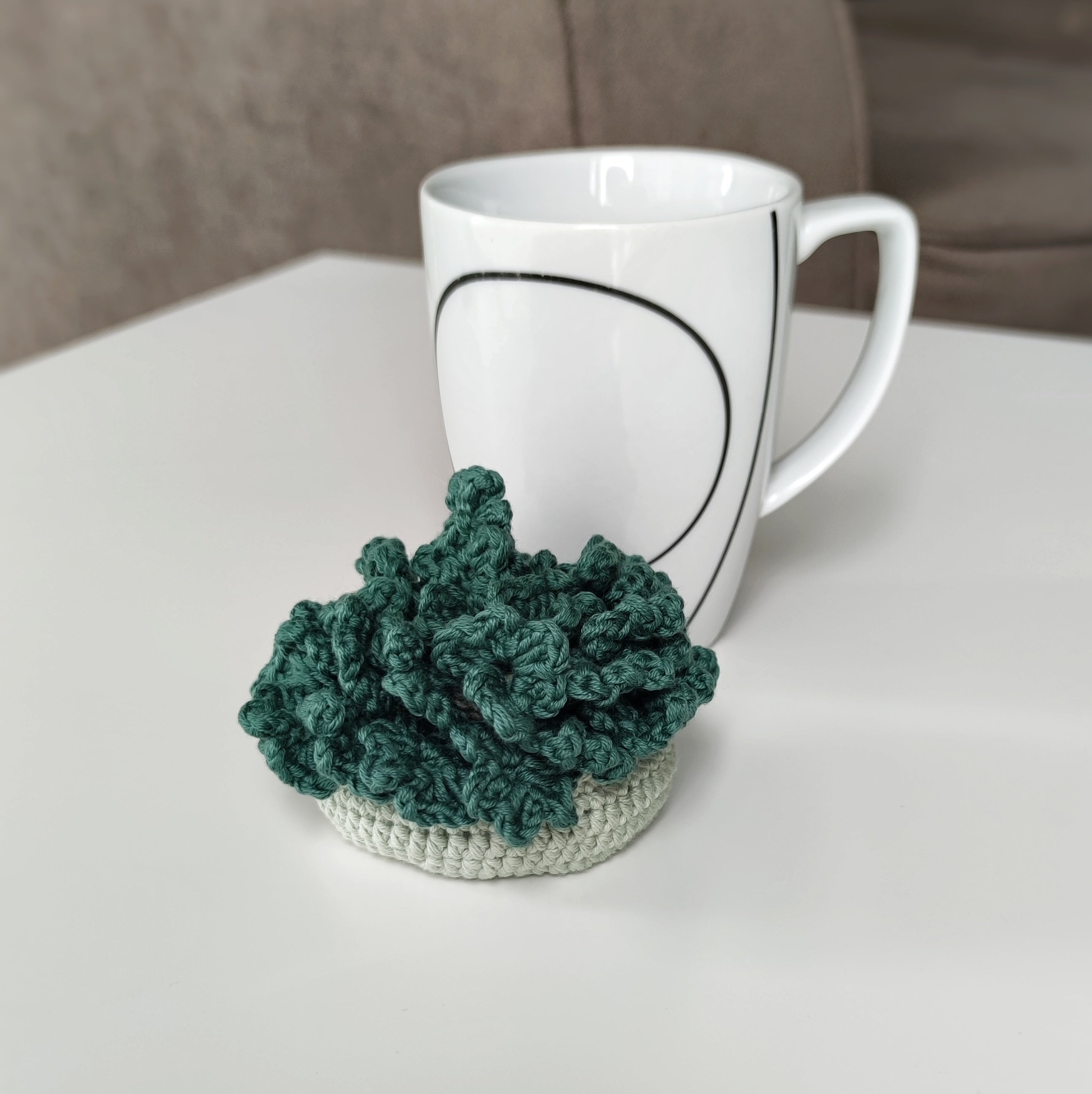 Clover crochet coaster pattern with shamrock shape, green textured mug rug for coffee cup, St Patrick’s Day inspired crochet decor