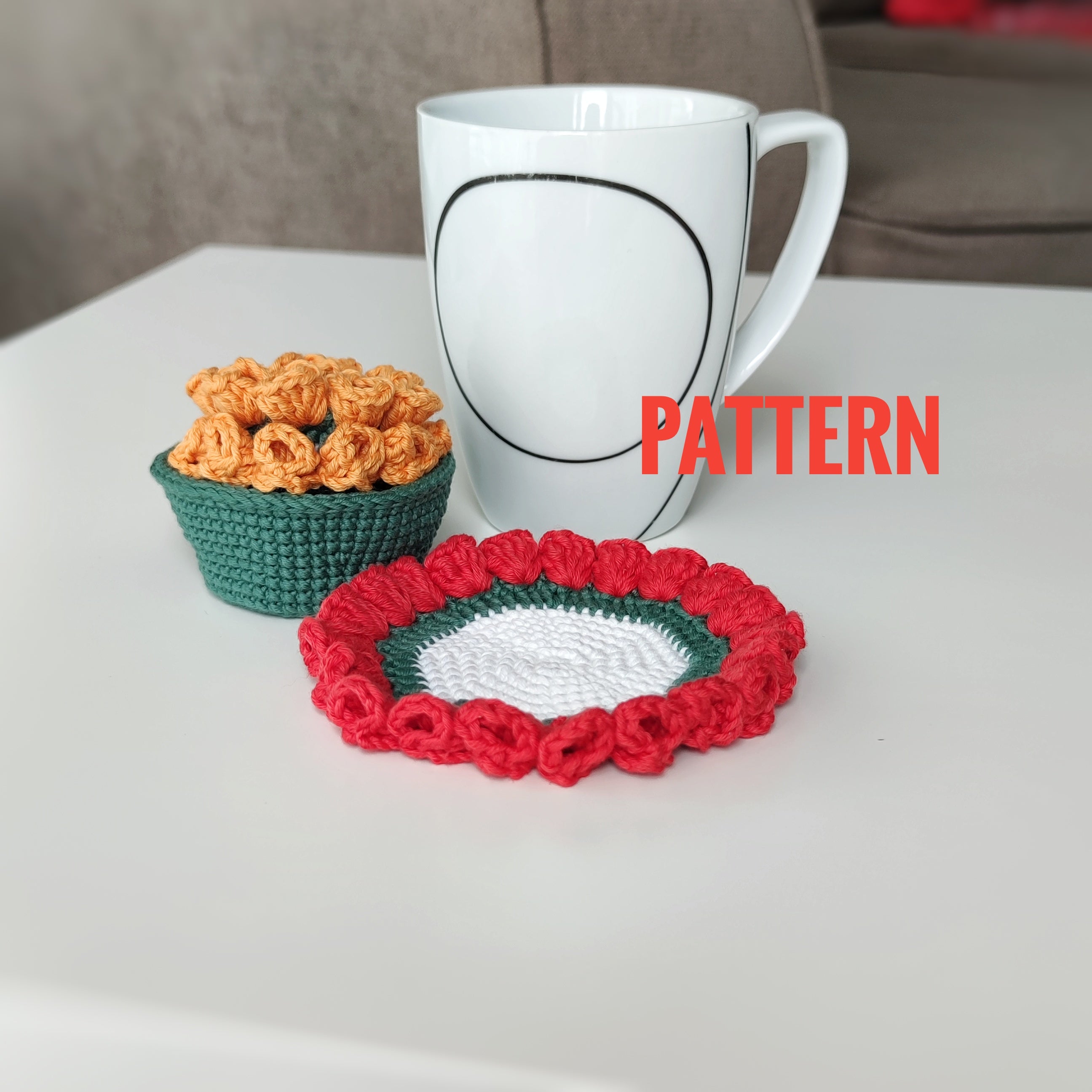 Crochet flower coaster and small crochet basket with decorative petals, pattern example shown.