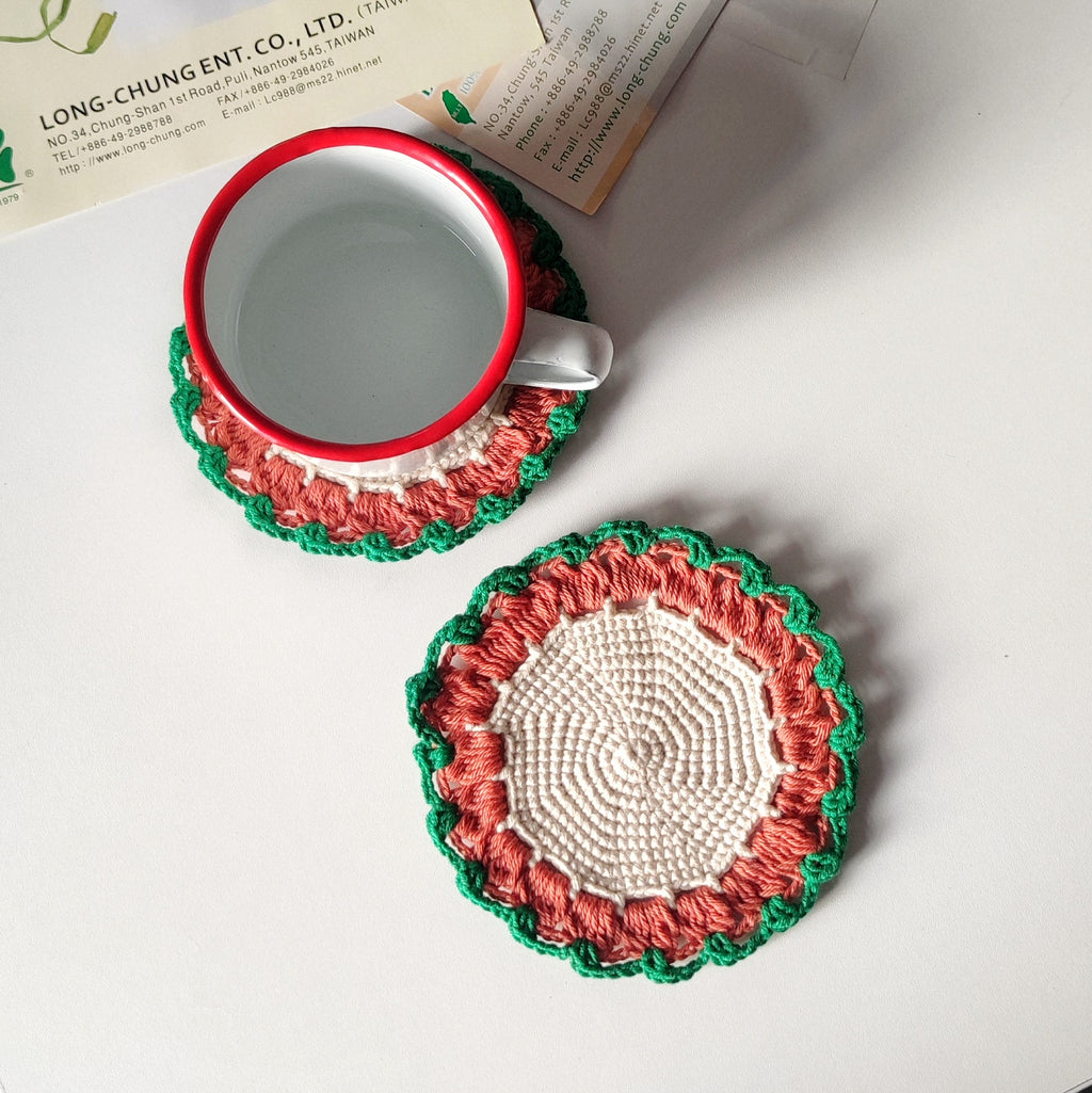 Beginner friendly crochet coaster used under a cup, simple round coaster pattern example shown.