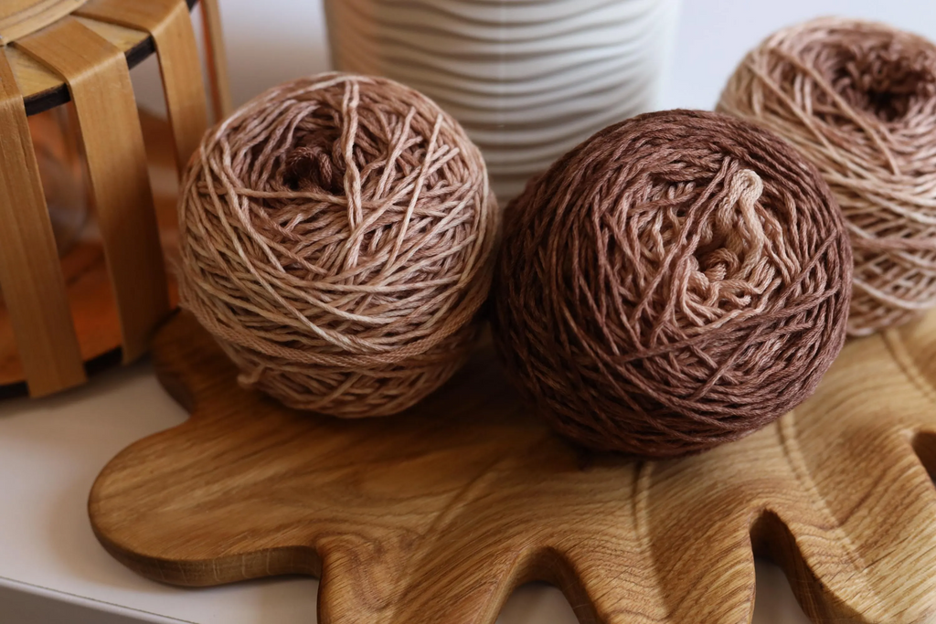 Hand dyed merino wool yarn in chocolate brown, cocoa, and soft beige gradient shades, DK weight 100% merino yarn for knitting and crochet.