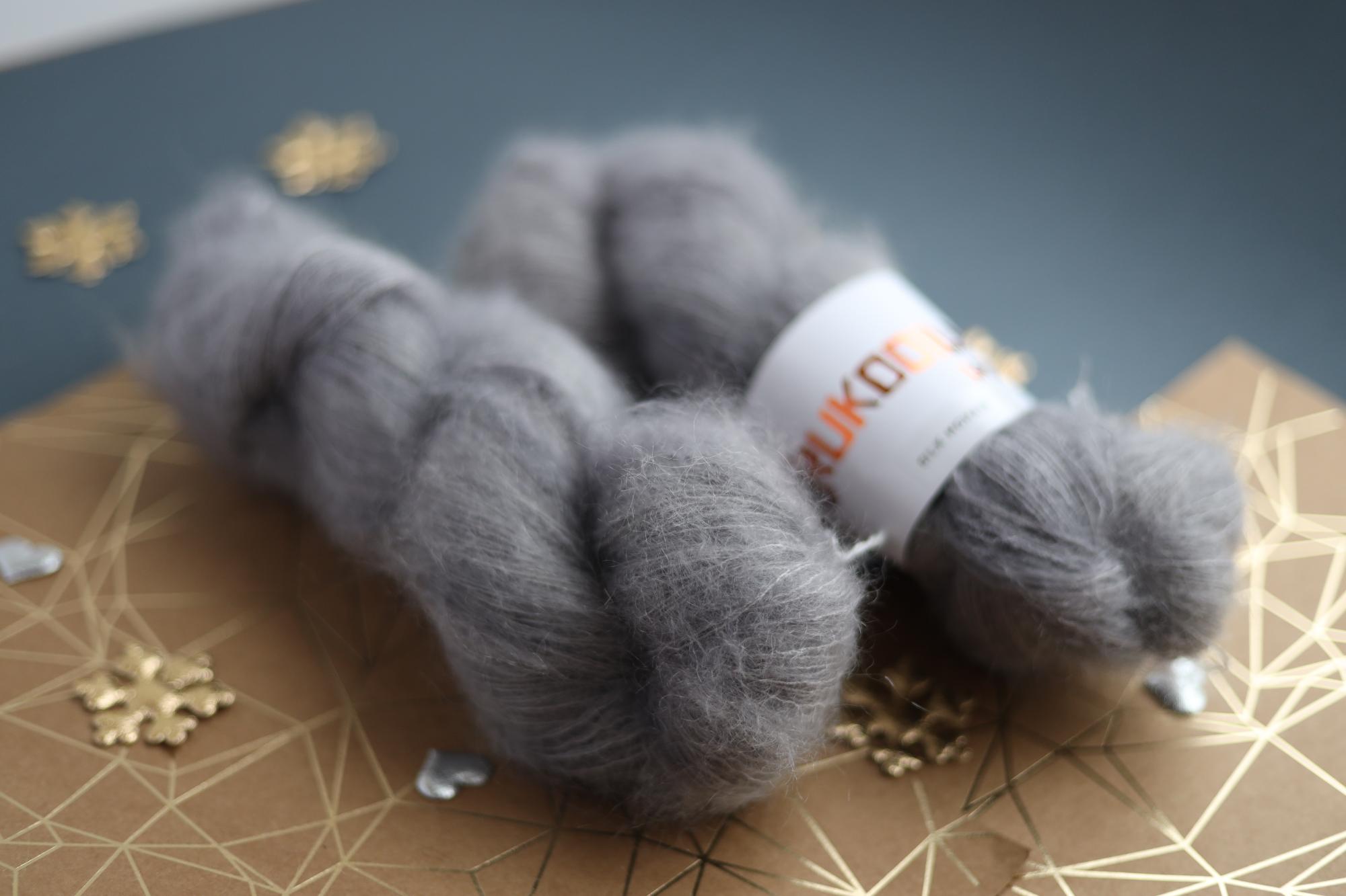 hand dyed silver gray mohair silk yarn skein with soft fluffy halo