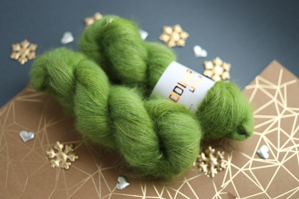 hand dyed apple green mohair silk yarn skein with soft fluffy halo