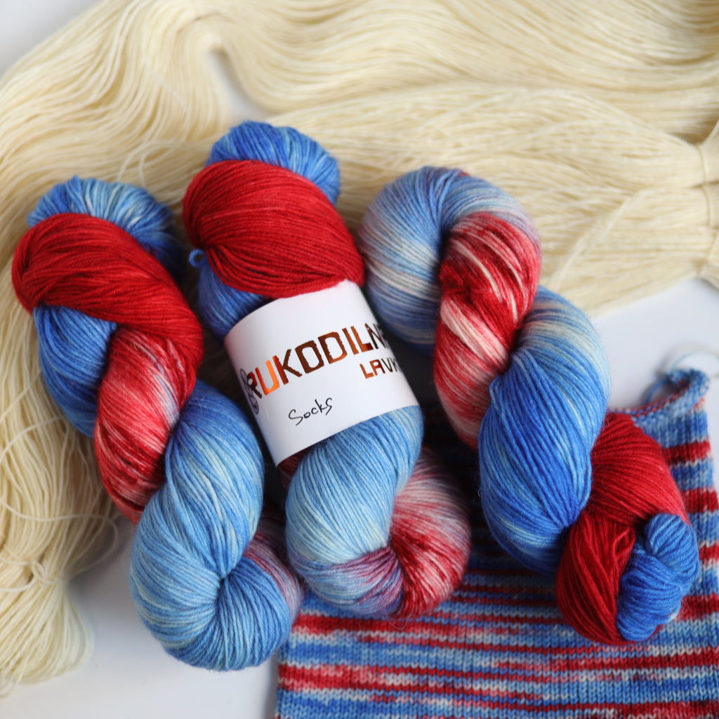 Hand dyed red and blue sock yarn made from Italian superwash wool, fingering weight 4-ply yarn dyed in Ukraine