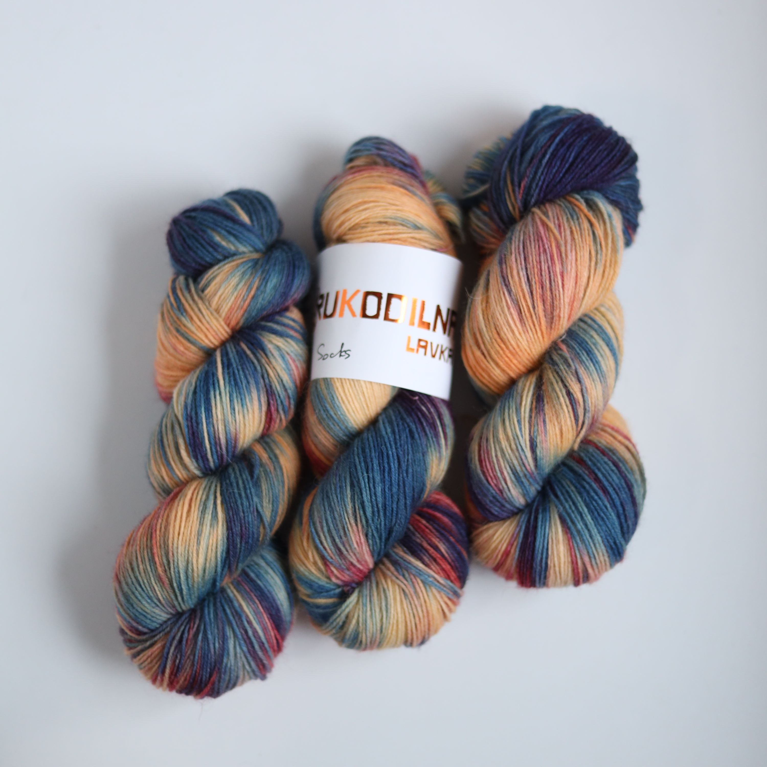 Hand dyed variegated sock yarn skeins in fingering weight wool