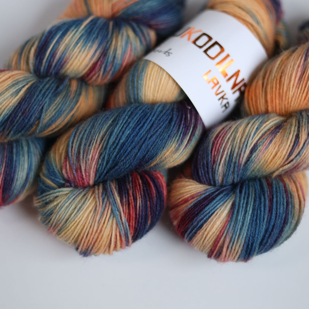 Hand dyed variegated sock yarn skeins in fingering weight wool