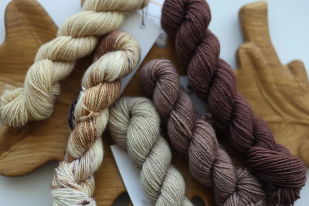 Hand dyed neutral mini skein set in beige, cream and brown shades, fingering weight wool nylon sock yarn for knitting socks, shawls and colorwork.