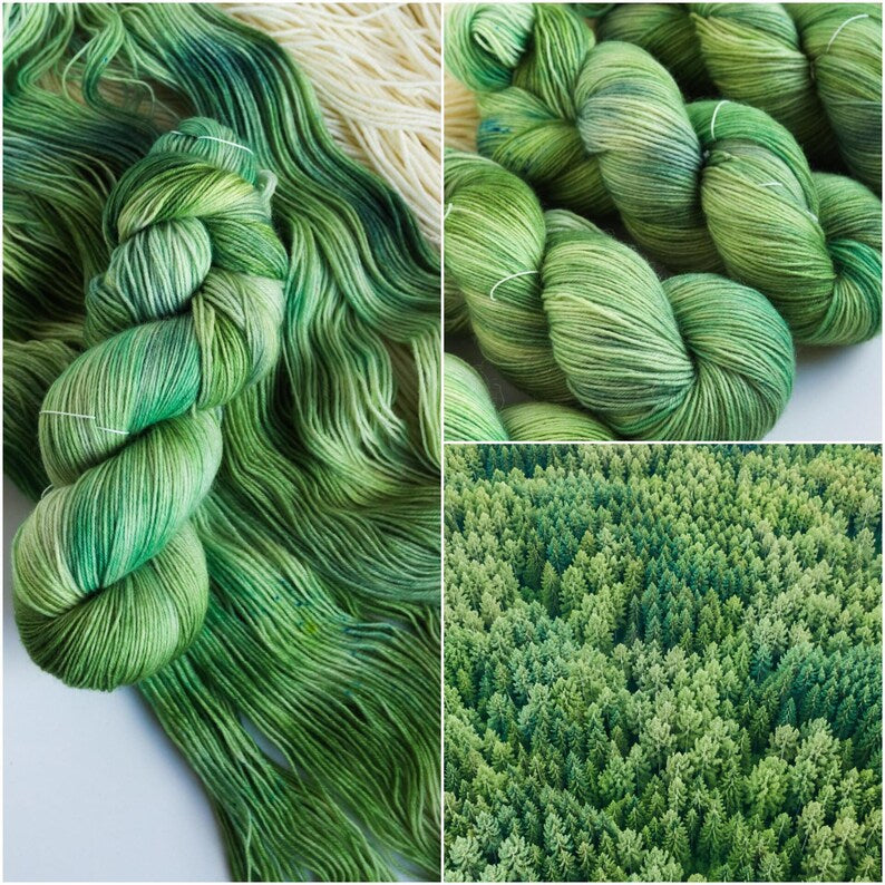 Hand dyed sock yarn in forest green shades with sage, moss, mint and pine green color transitions on a superwash wool nylon base