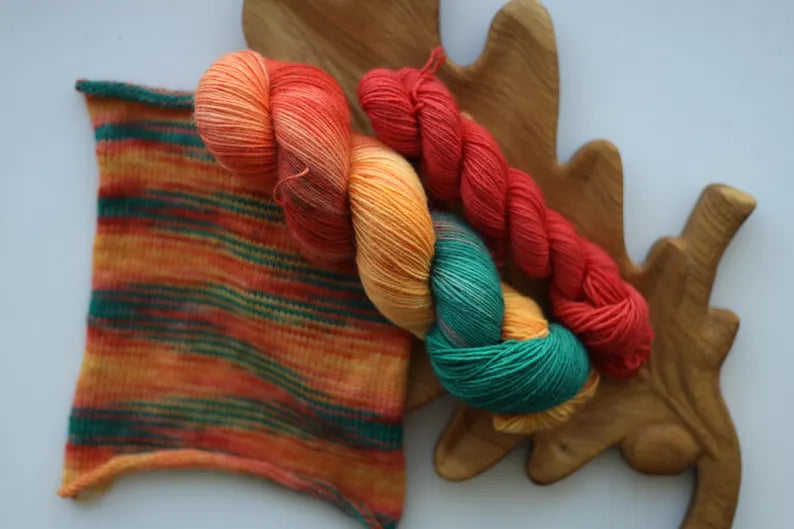 Hand dyed sock yarn set with matching mini skein in coral, green, red, and yellow, 100g + 20g fingering weight wool nylon knitting yarn for socks.