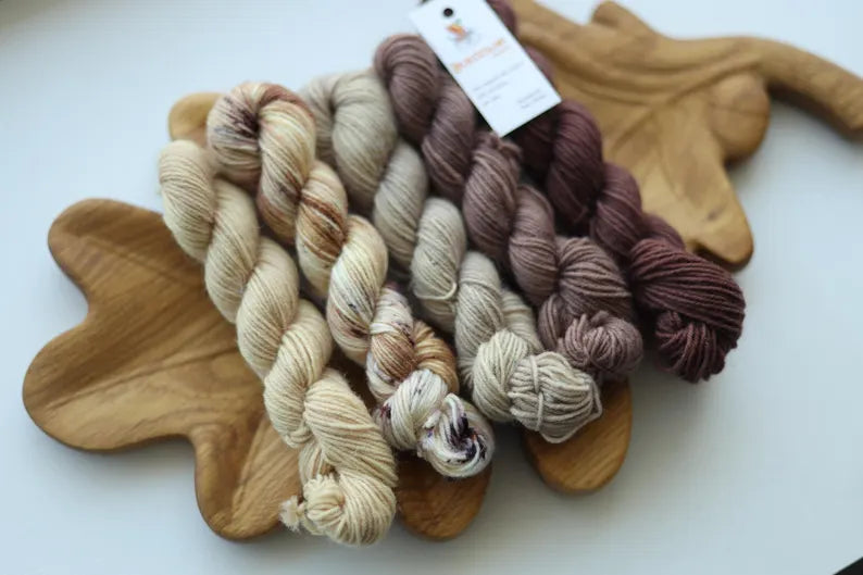 Hand dyed neutral mini skein set in beige, cream and brown shades, fingering weight wool nylon sock yarn for knitting socks, shawls and colorwork.