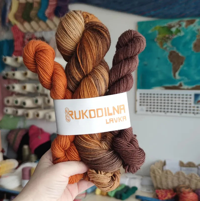 Hand dyed sock yarn set with one 100g skein and two 20g mini skeins in burnt orange, caramel and chocolate brown shades for knitting colorful socks.