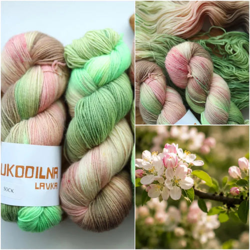 Hand dyed sock yarn in fresh green, blush pink, cream and delicate speckles inspired by blooming apple blossoms, fingering weight wool nylon knitting yarn.