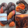 Hand dyed variegated sock yarn in smoky grey, charcoal, coral and bright orange shades, superwash wool nylon fingering weight 4 ply yarn for knitting socks shawls and sweaters