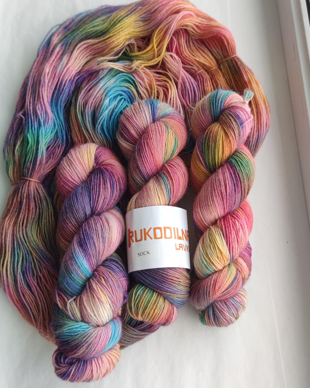 Hand dyed variegated sock yarn in layered jewel tones, wool polyamide fingering weight 4ply yarn for knitting socks, shawls and sweaters