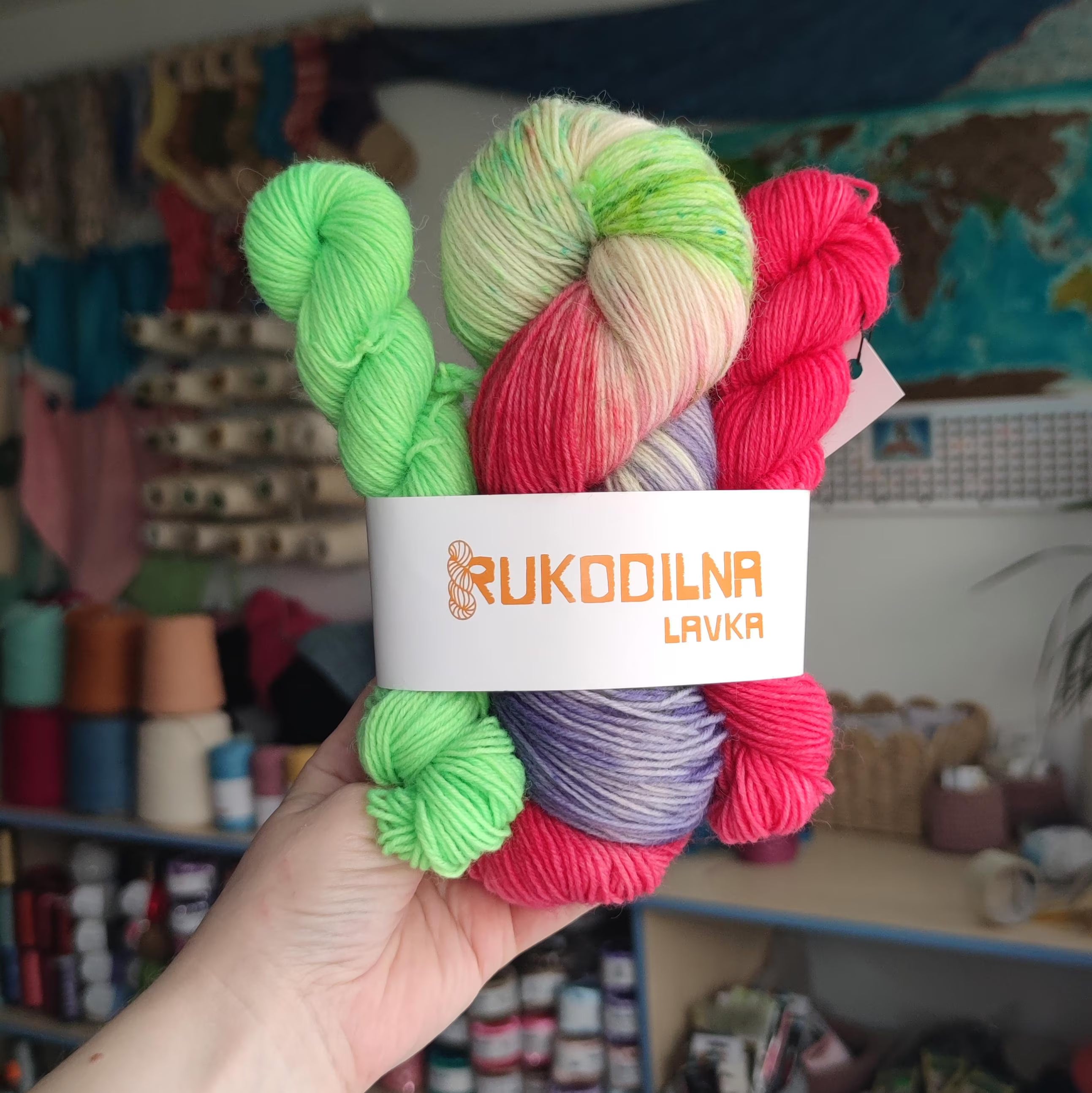 Hand dyed yarn set with one full skein and two mini skeins in bright pink, purple and green shades inspired by blooming lupine flowers.
