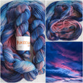 Hand dyed sock yarn in electric blue, raspberry red, icy pink and deep cobalt tones on superwash wool nylon fingering weight base.