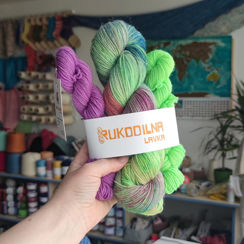 Hand dyed sock yarn set with mint green main skein and coordinating neon green and lilac mini skeins for knitting and crochet projects.